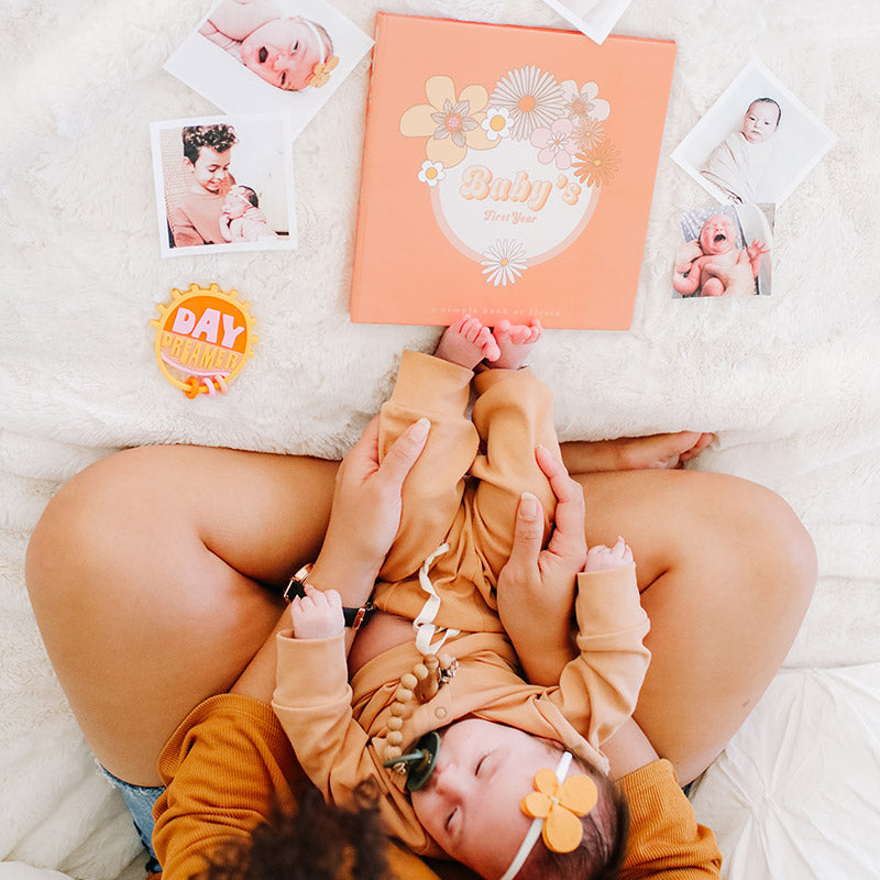 Flower Child Memory Baby Book with a baby and newborn photos
