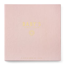 Wildflower Meadow Luxury Baby Memory Book with blush pink linen cover and gold embossed daisy — heirloom keepsake