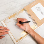 My Foot Book: Footprints Through the First Year — open to interior pages